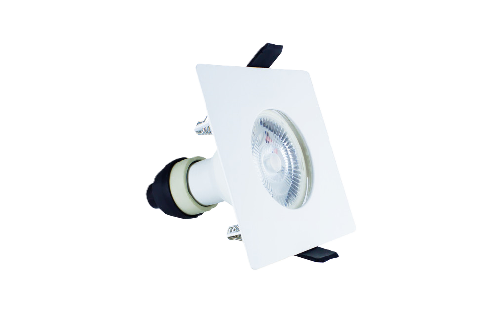 side angle shot of Integral LED Evofire Standard 70mm cut-out square white fire-rated downlight. Angle shows bezel with lamp fitted and the open-back design.